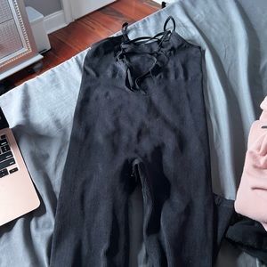 black opened back jumpsuit